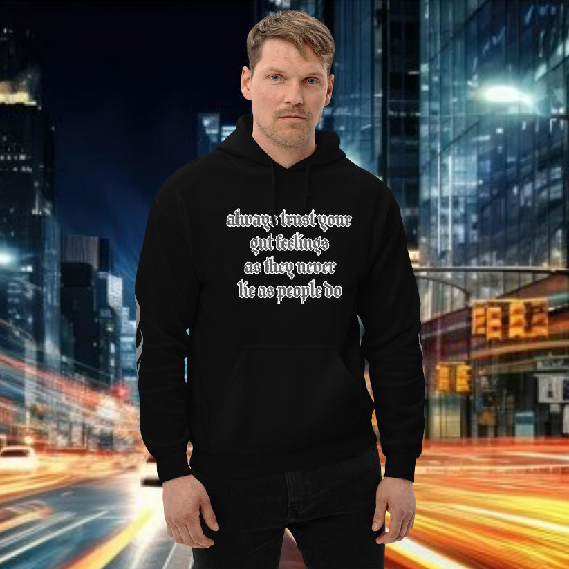 A man wearing a black hoodie with text, showcasing functional streetwear for survival.