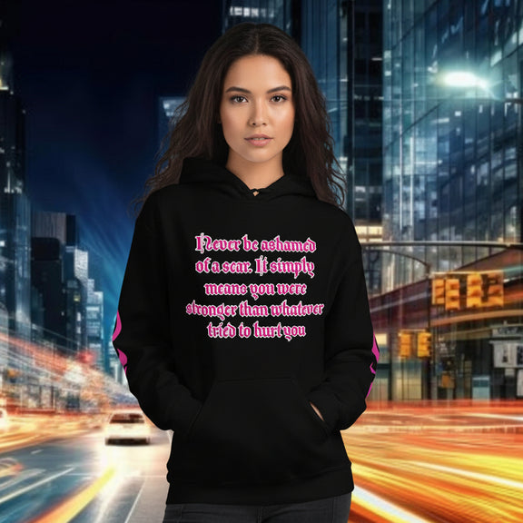 Model wearing resilience streetwear hoodie with inspirational quote on city background.