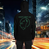 Oversized streetwear hoodie warrior with wolf graphic and 'Don't Test Me' text on back, designed for silent strength.