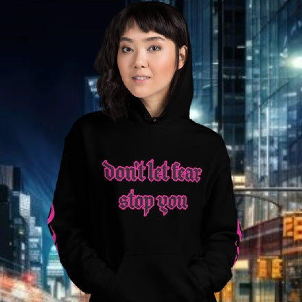 Oversized streetwear hoodie with bold text 'don't let fear stop you', perfect for confident fashion statements.