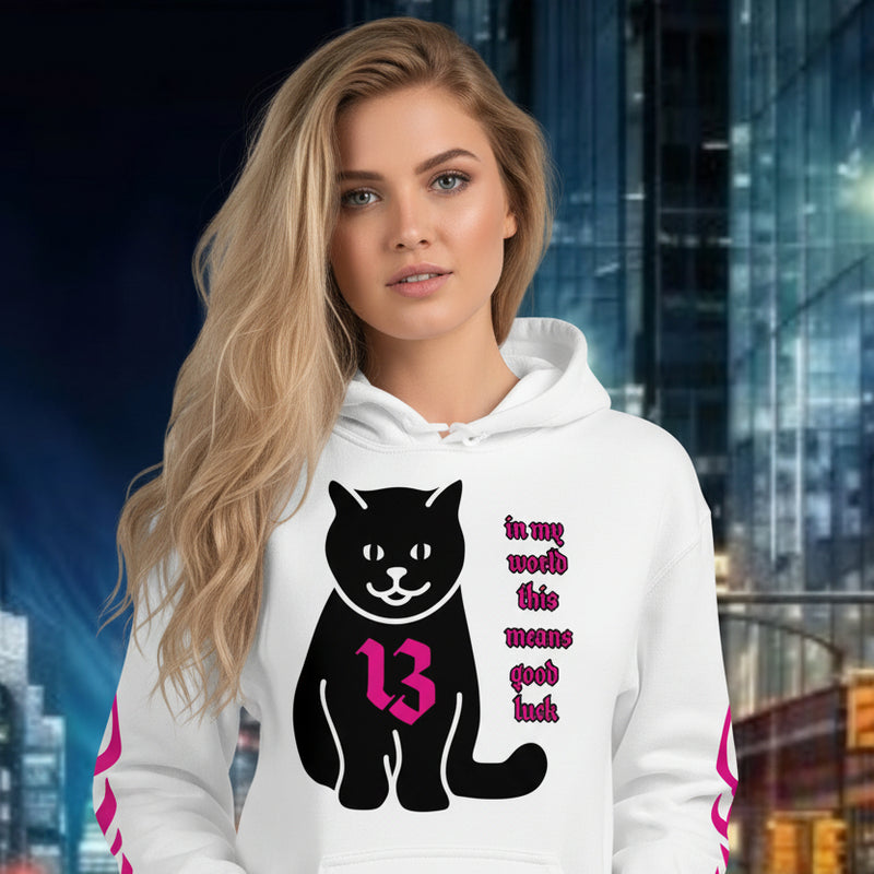 Model wearing oversized streetwear hoodie with black cat and number 13 design in a cityscape background.